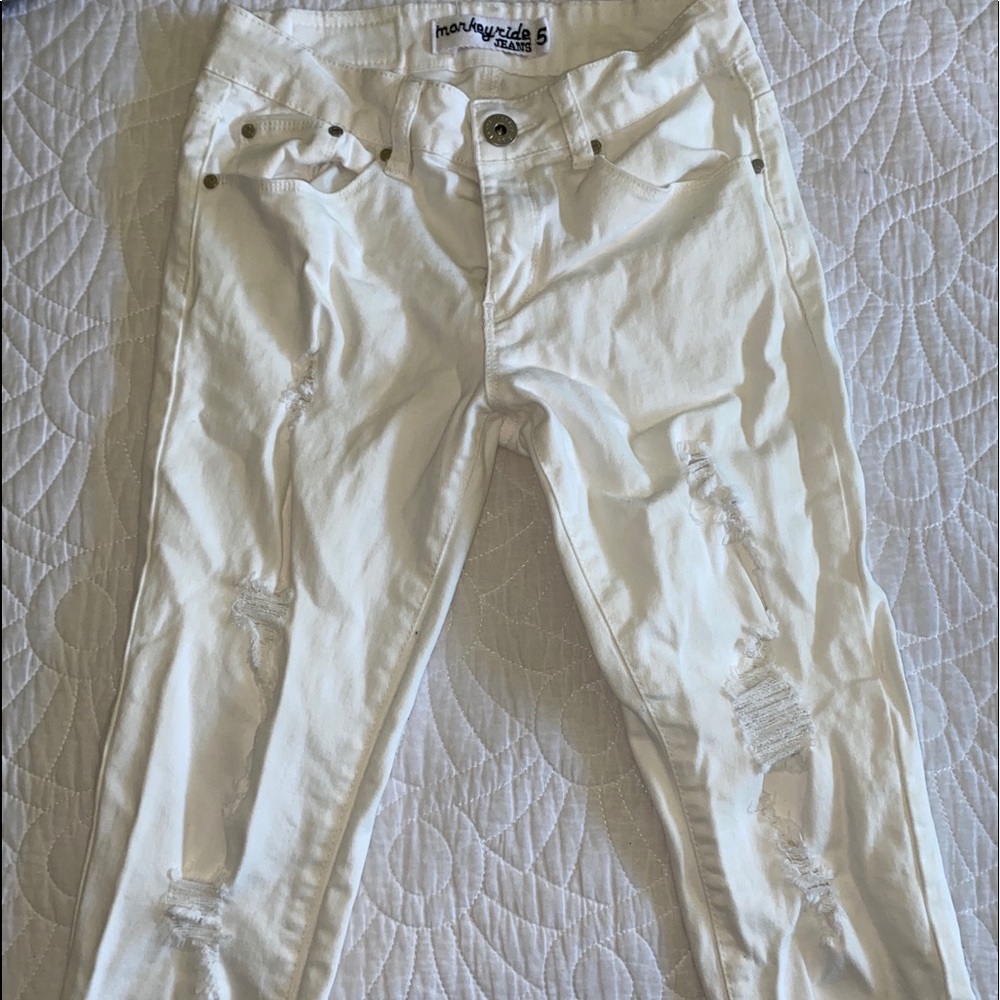 white ripped denim jeans